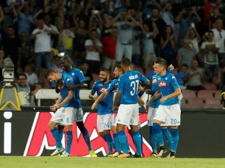 Les joueurs de Naples à la fête après le but du break par Jorginho, sur pénalty, contre Nice. AFP