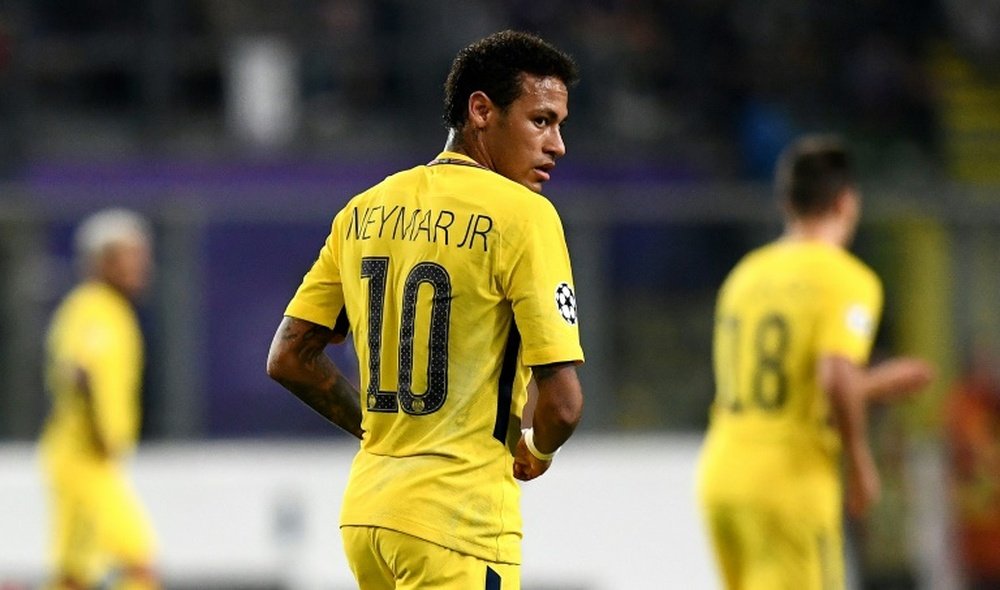 Emery thinks Neymar must continue to adapt and improve in order to emulate Messi. AFP