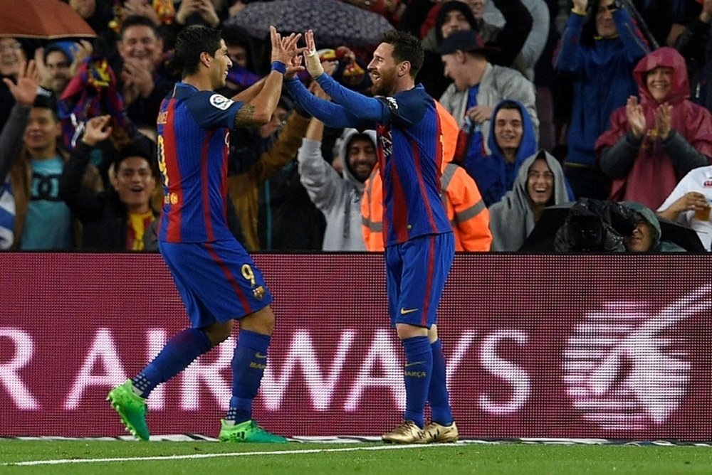 La joie de Lionel Messi et Luis Suarez, buteurs pour le FC Barcelone contre le Séville FC. AFP