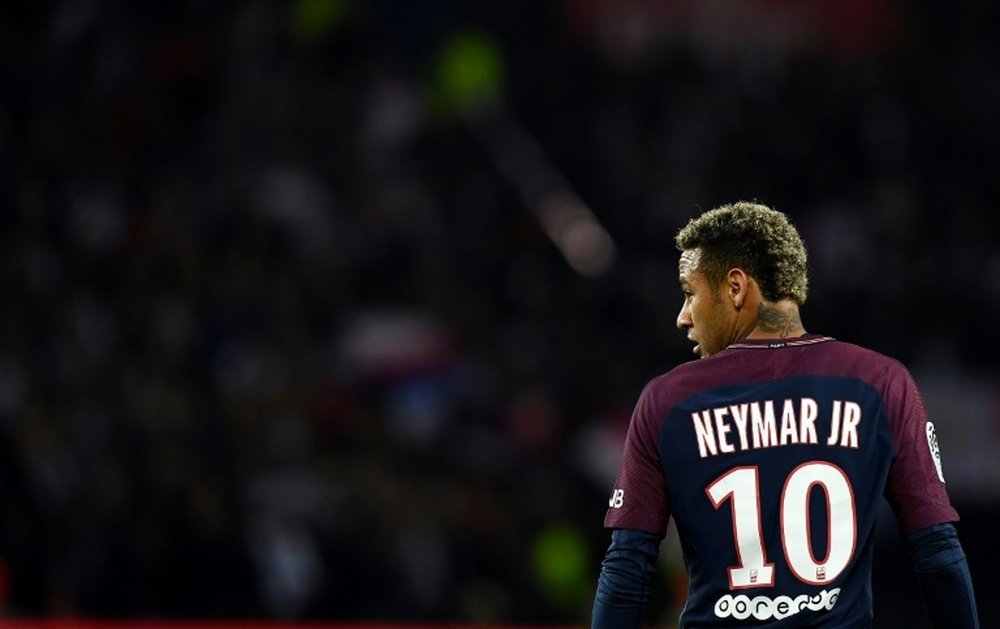 Neymar may not be as happy as people think at PSG. AFP