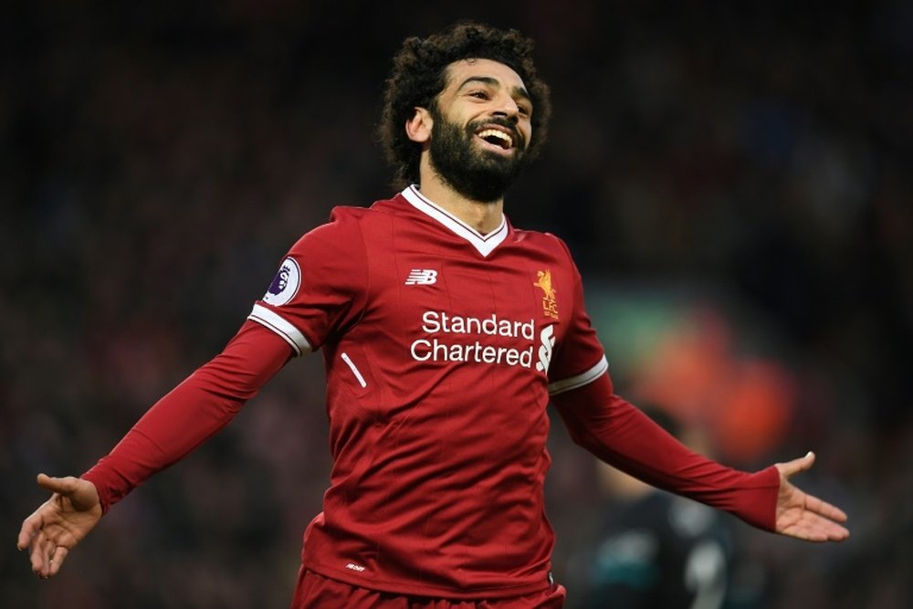 Salah is the Premier League's to scorer with 13 goals from 16 games. AFP