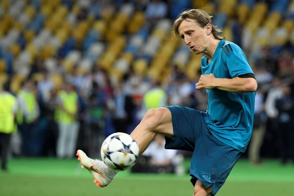 Modric appears to have made his desire to stay at Real clear. AFP