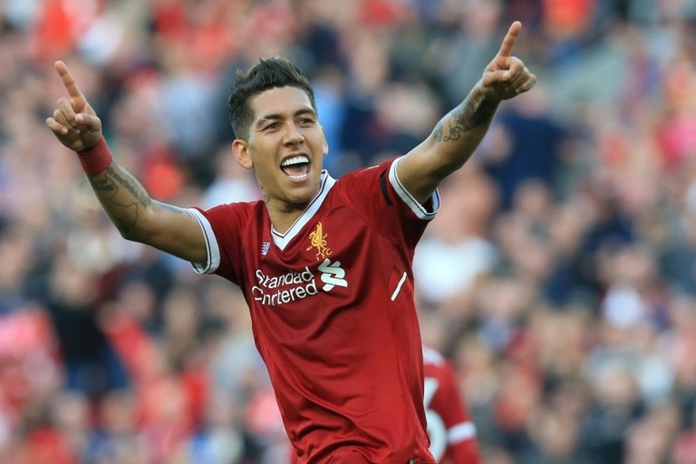 Roberto Firmino has confirmed that he is OK after suffering an eye injury against Tottenham. AFP