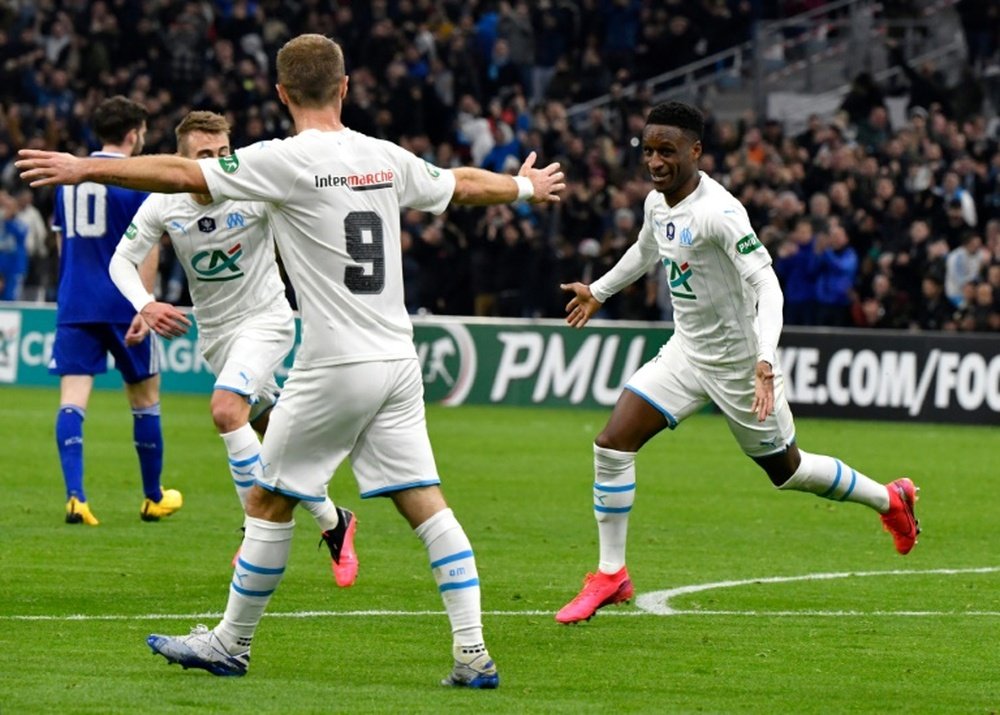 Bouna Sarr (R) is wanted by Atletico Madrid. AFP