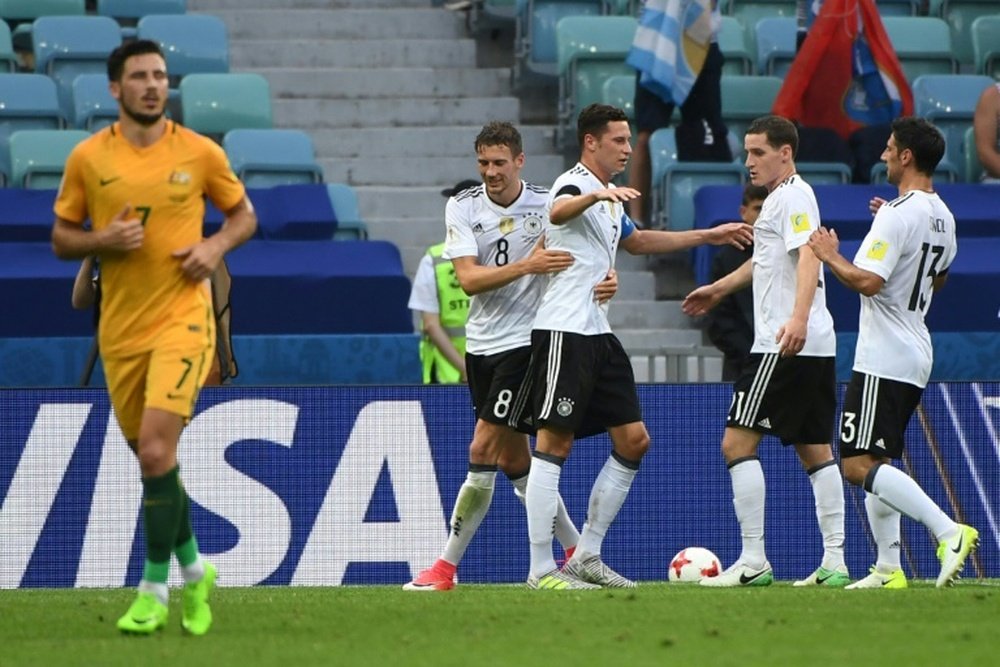 Le capitaine de la 'Mannschaft' Draxler fête son but contre l'Australie avec ses coéquipiers. AFP