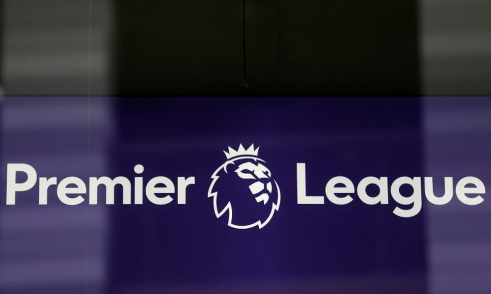 Premier League rules out completing the season in China. AFP