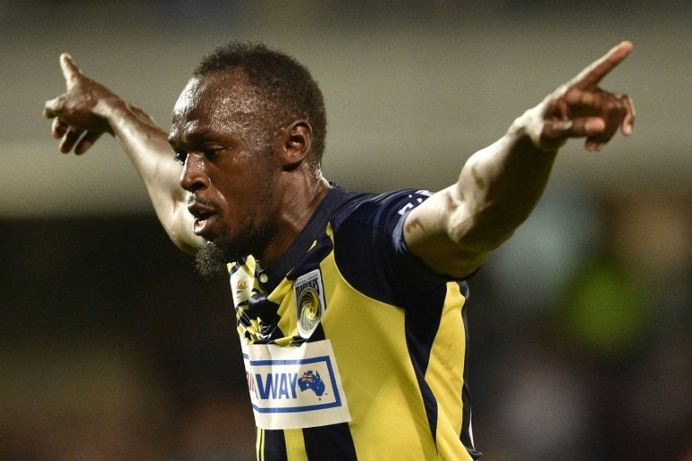 Olympic sprinter Usain Bolt is trying to launch a career as a footballer. AFP