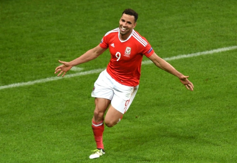 Robson-Kanu celebrates his goal against Belgium in EURO 2016. AFP