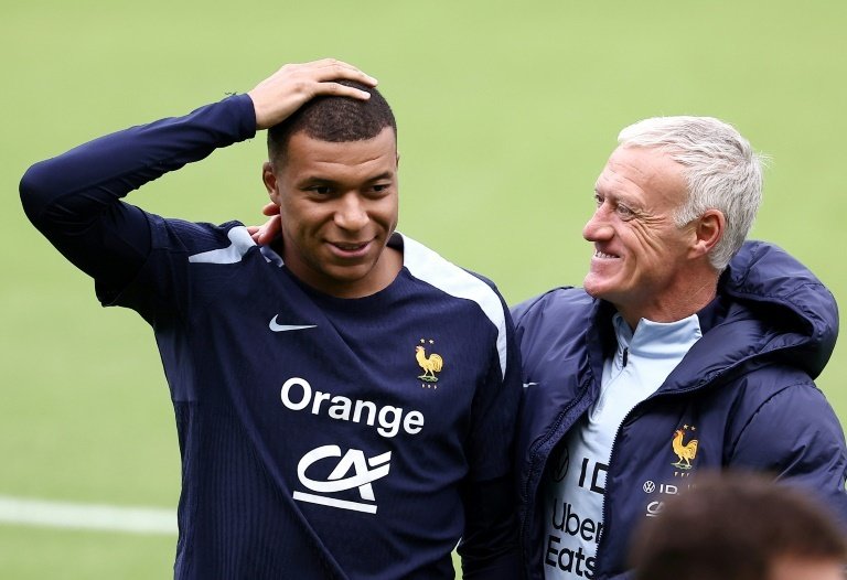 Deschamps predicted a successful future for Mbappe. AFP