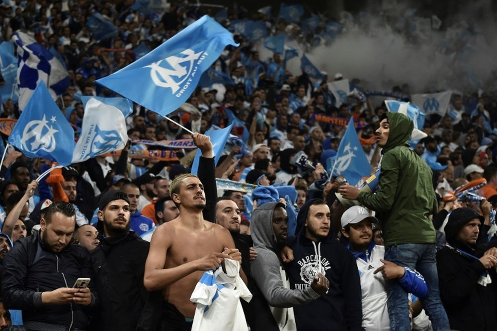 La pasión por el Olympique no entiende de colores políticos. AFP/Archivo
