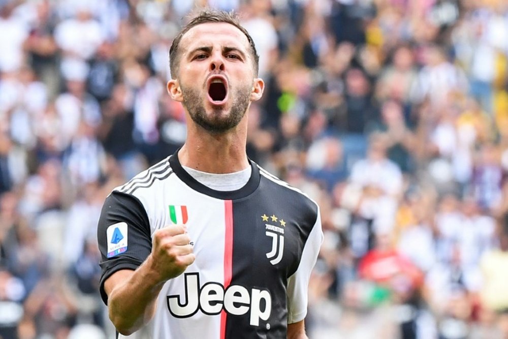 Pjanic has reportedly given the thumbs up to sign for Barcelona. AFP