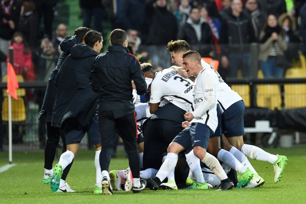 La joie de Marco Verratti et de ses coéquipiers du PSG après la victoire arrachée à Metz. AFP