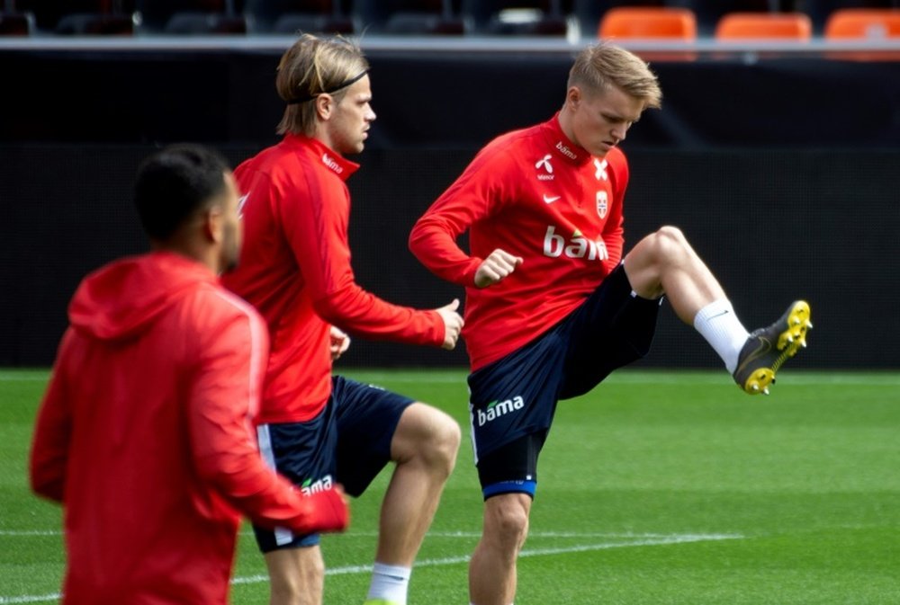 Odegaard has been in San Sebastian as he may go on loan to Real Sociedad. AFP