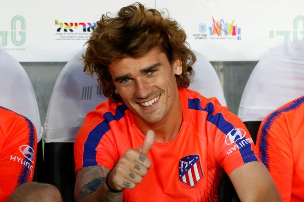 Griezmann's lawyers are now in the La Liga HQ to pay his buyout clause. AFP