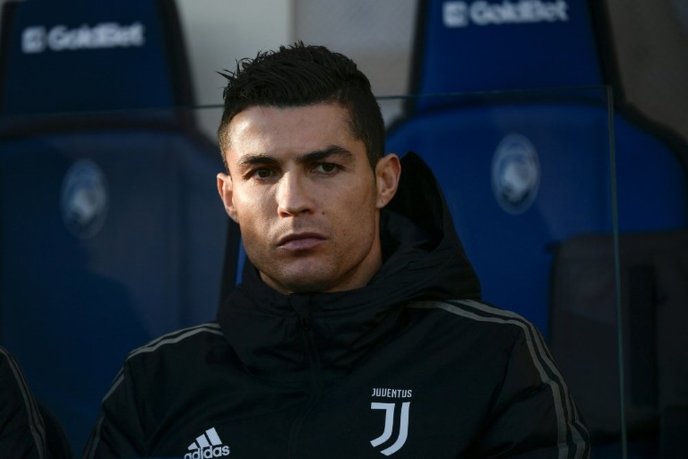 Cristiano Ronaldo viaja para Madrid quarta-feira. AFP