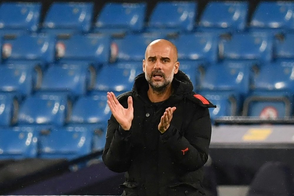 Pep Guardiola exaltou o momento do Manchester City. AFP
