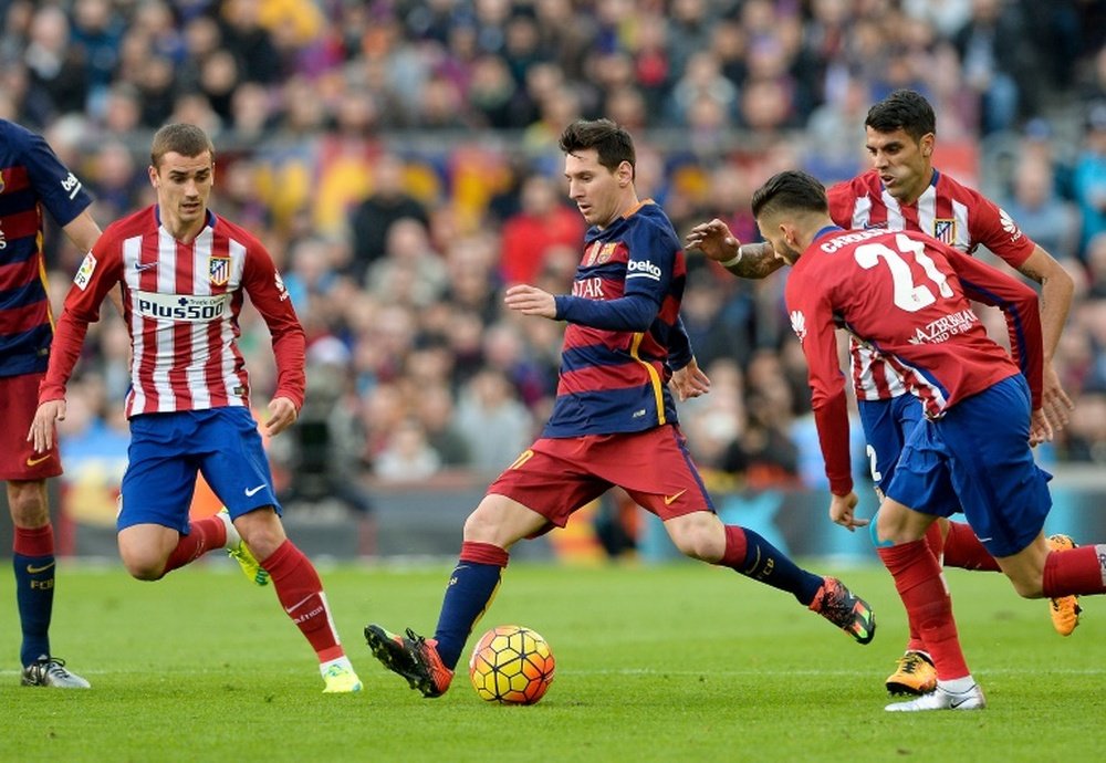 Messi quer ver Griezmann no Barça. AFP