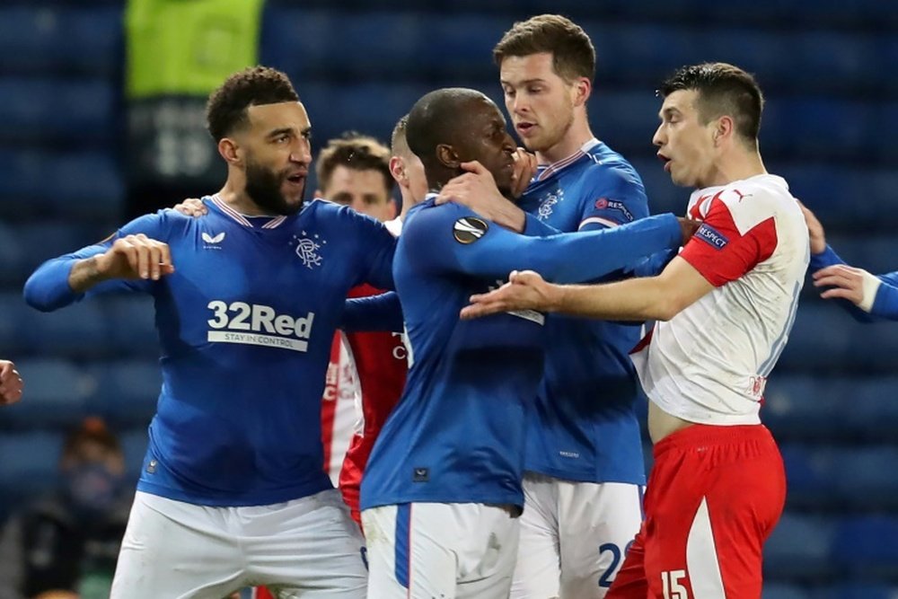 Connor Goldson (L) reveals what happened between Rangers and Slavia. AFP