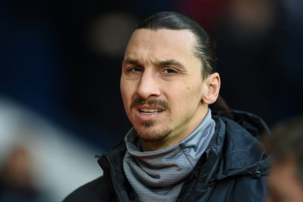 Ibrahimovic not injured but being frozen out by Mourinho, claims Mutu. AFP