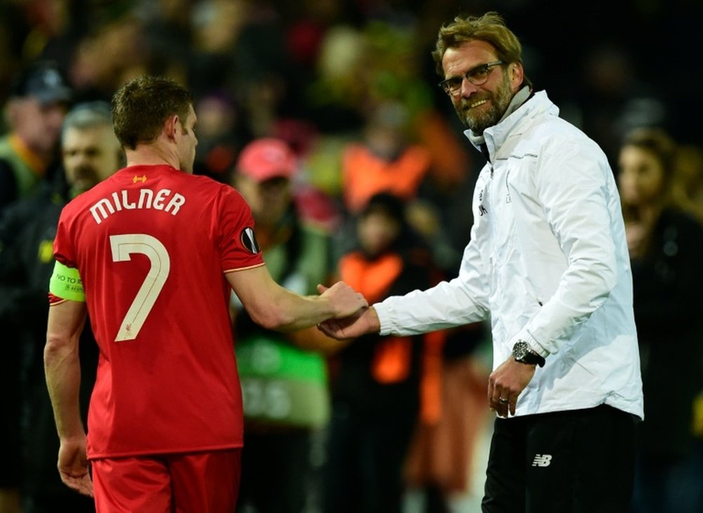 James Milner and Jurgen Klopp. BeSoccer