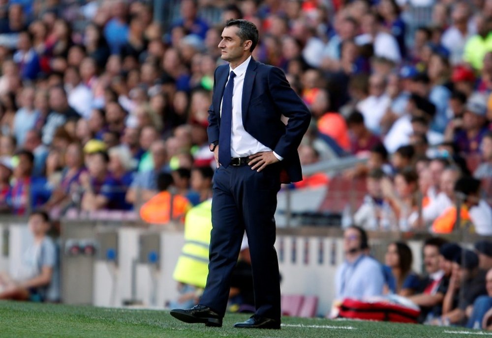 Ernesto Valverde is planning to make tactical changes before the Tottenham match. AFP