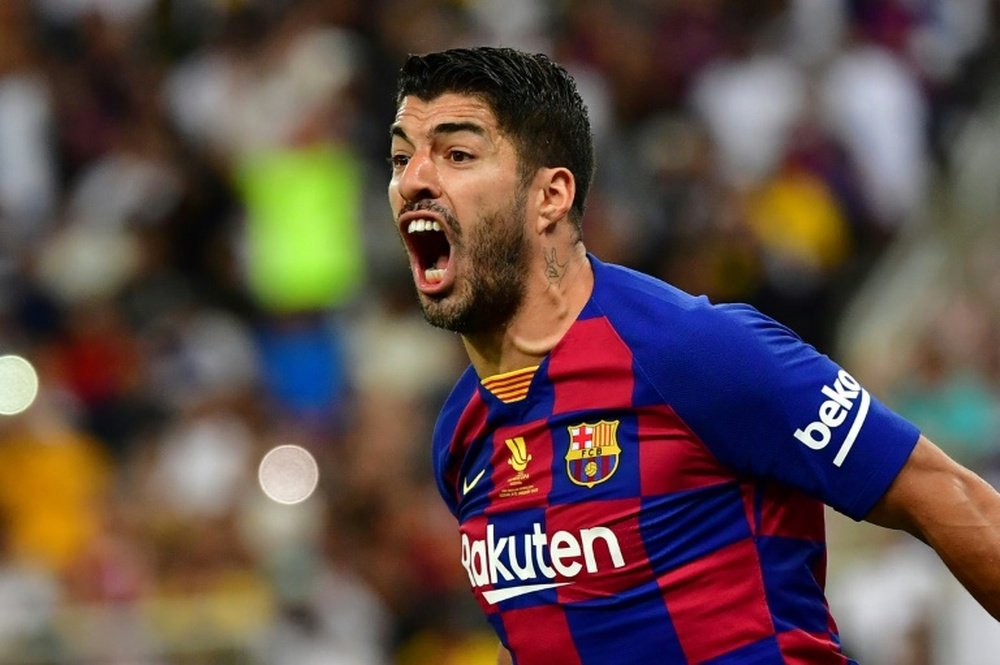 VIDEO: Luis Suárez hit four as Barça thumped Sporting Gijon 6-0. AFP