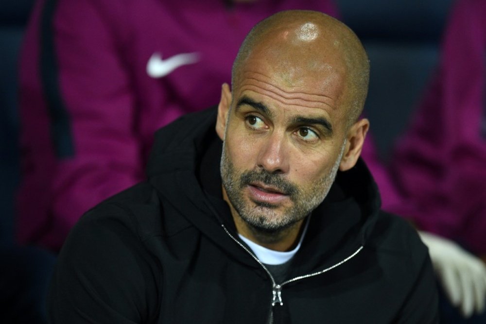 Lentraîneur de Manchester City Pep Guardiola suit le match face à West Bromwich Albion. AFP