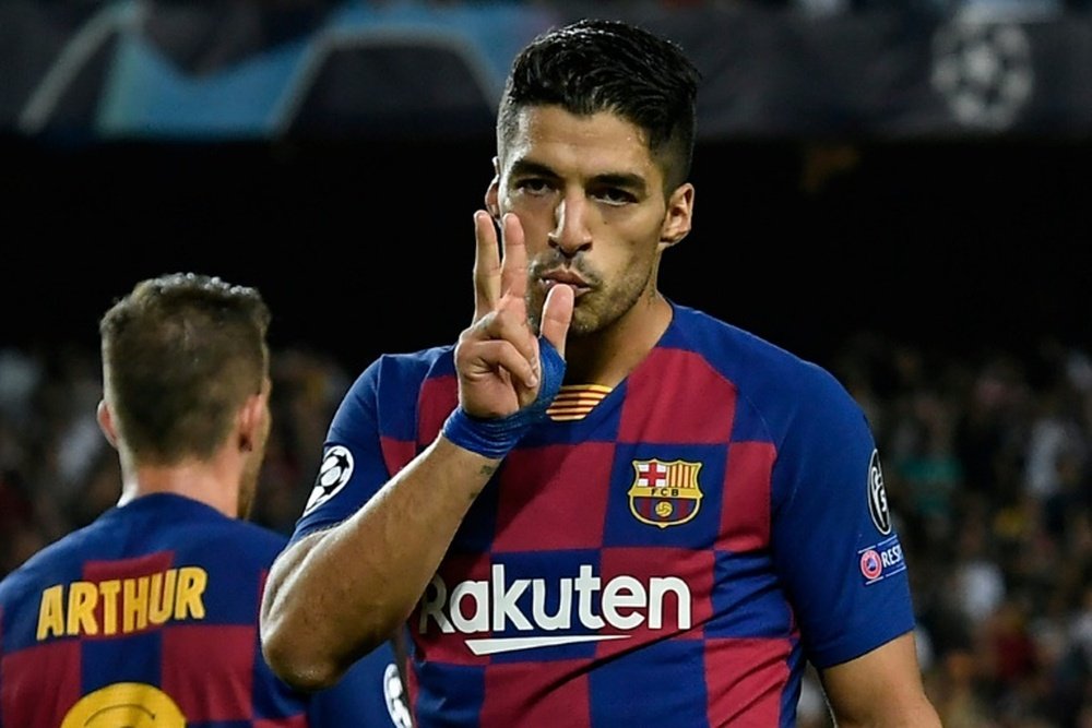 AS: Suarez will be eased back in. AFP