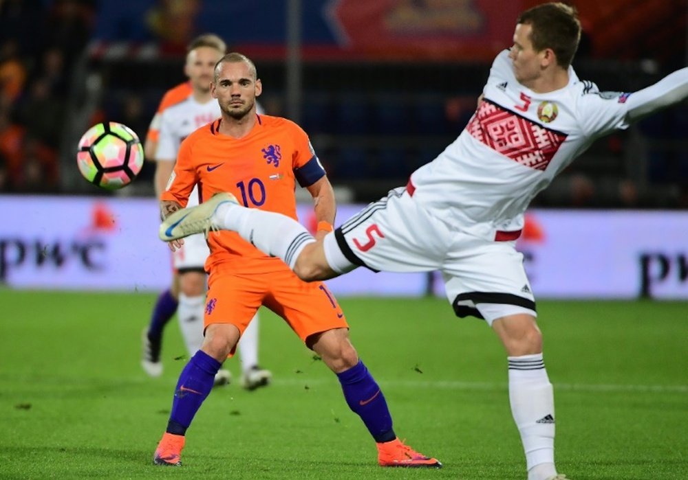 Wesley Sneijder will miss the mouthwatering visit of France in Mondays World Cup qualifier. AFP