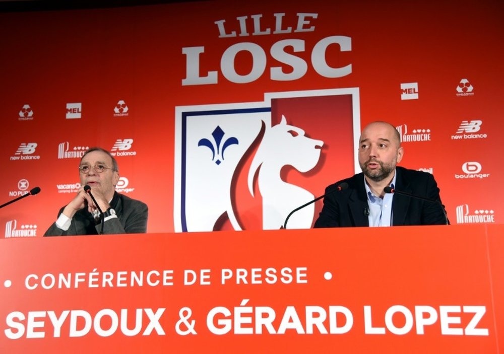 Le président de Lille Michel Seydoux et Gérard Lopez, lors dune conférence de presse. AFP