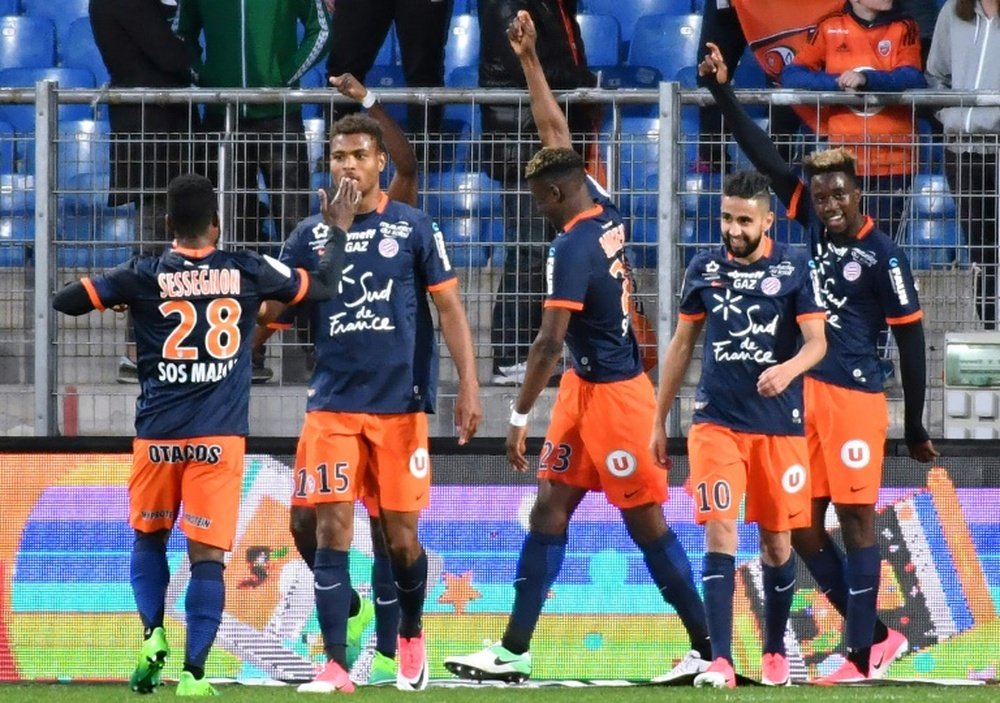 Les joueurs de Montpellier en liesse après le but de l'attaquant Isaac Mbenza contre Lorient. AFP