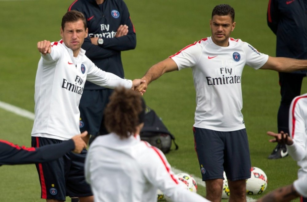 Grzegorz Krychowiak et Ben Arfa, recrues de l'été du PSG, à l'entraînement au Camp des Loges. AFP