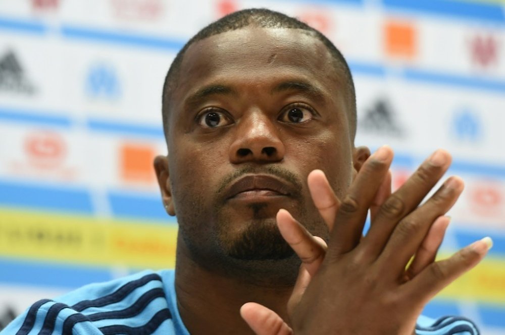 Evra spoke out for the first time after his karate kick incident. AFP