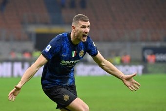 Real Madrid see Dzeko as the perfect back-up for Benzema. AFP