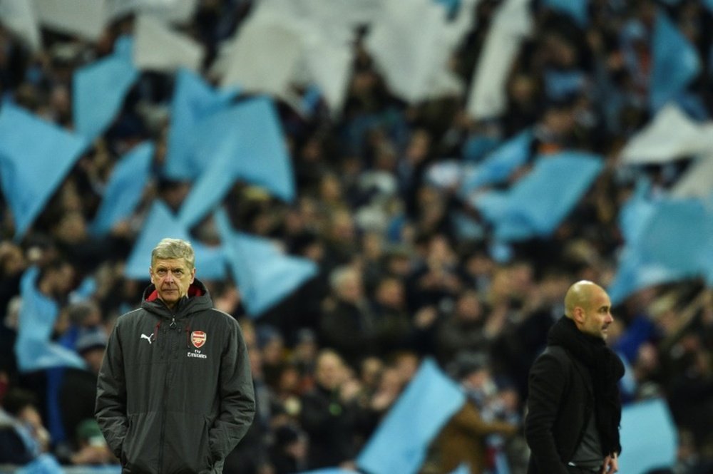 Guardiola offered his support to Wenger. AFP