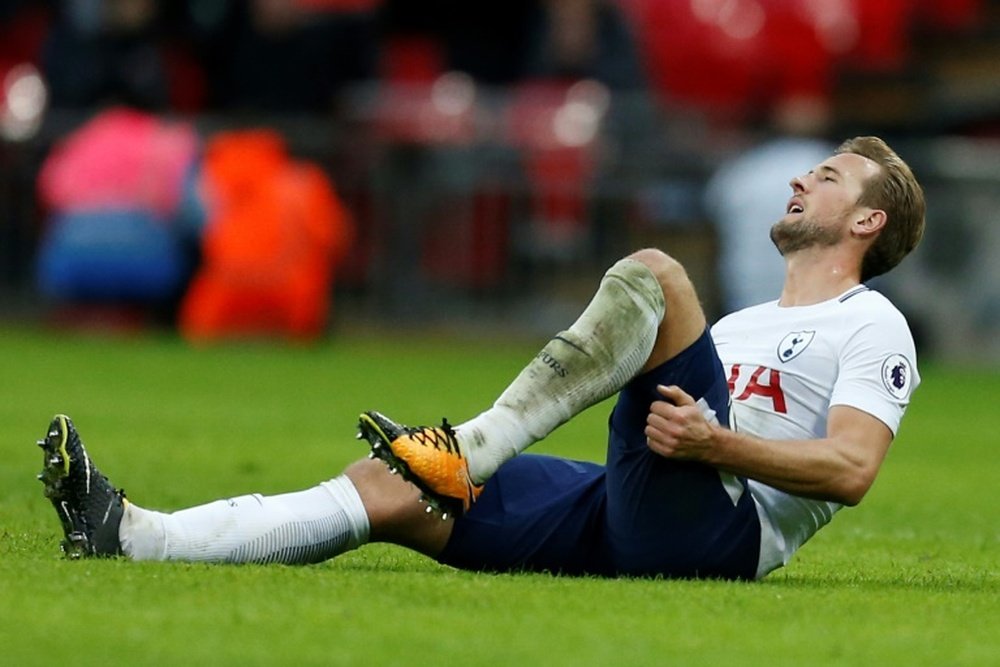 Kane will miss Tottenham's trip to Old Trafford on Saturday. AFP