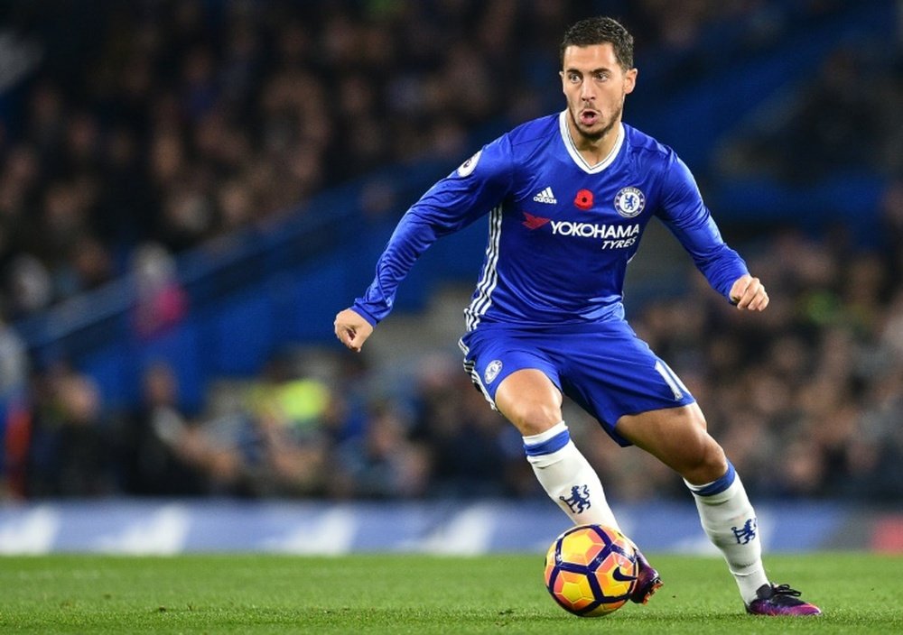 Hazard says the current Chelsea team is the best he's played in. AFP