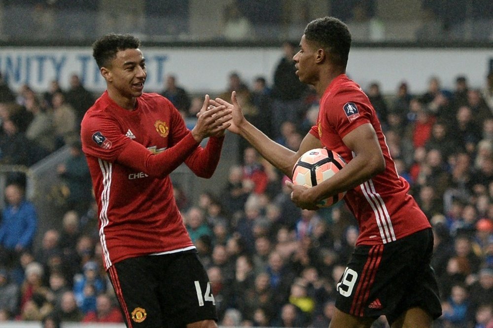 Lingard earned United a share of the spoils. AFP