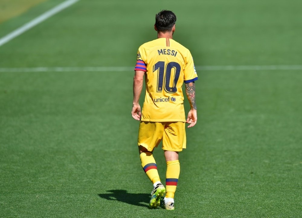 Fernando Gago é fã de Messi. AFP