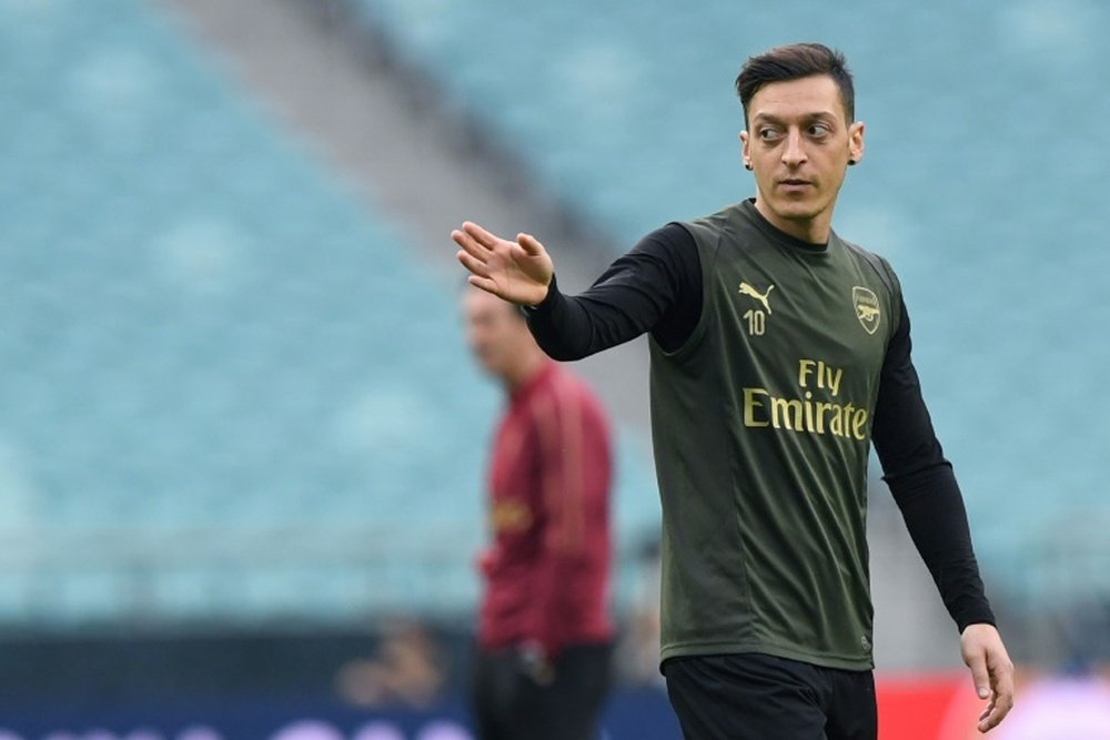 Özil-Arteta: the player claims he is fine. AFP