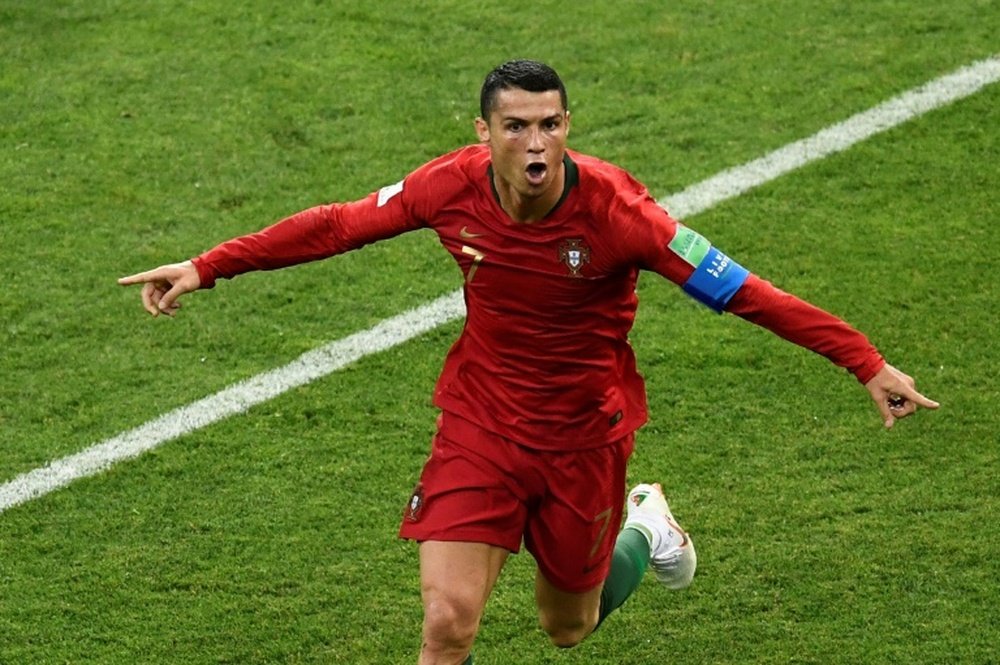 Cristiano Ronaldo consiguió un 'hat trick' ante España. AFP