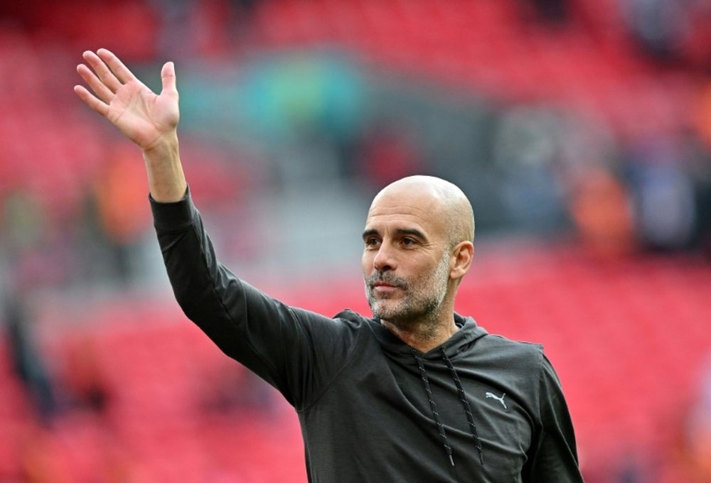 Guardiola will face Ten Hag on Saturday. AFP