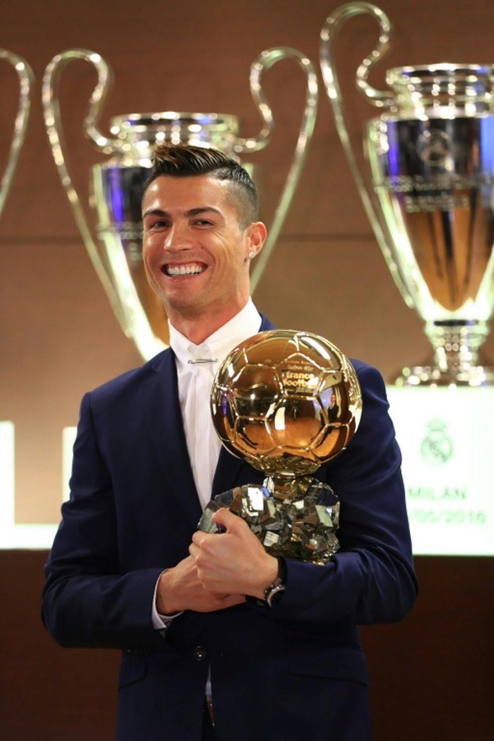 Ronaldo posing with the Ballon d'Or 2016 award. AFP