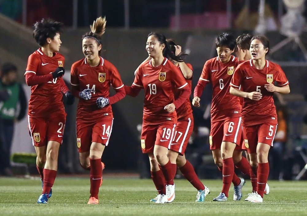 La joie des Chinoises après un but face au Japon en qualification olympique, le 4 mars 2016. AFP