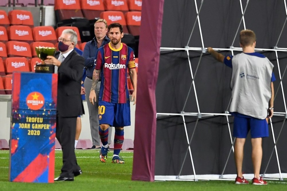 Messi and Koeman together at Barca. AFP