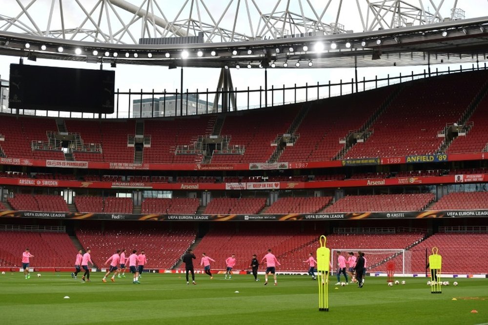 Les joueurs de l'Atletico Madrid lors d'un entraînement sur la pelouse de l'Emirates Stadium. AFP