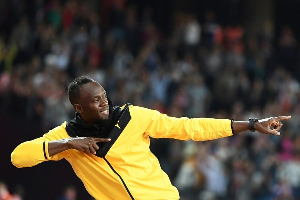 Usain Bolt probará con el Borussia Dortmund. AFP