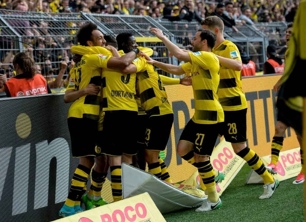 O atacante apontou um hat-trick no triunfo do Borussia. AFP