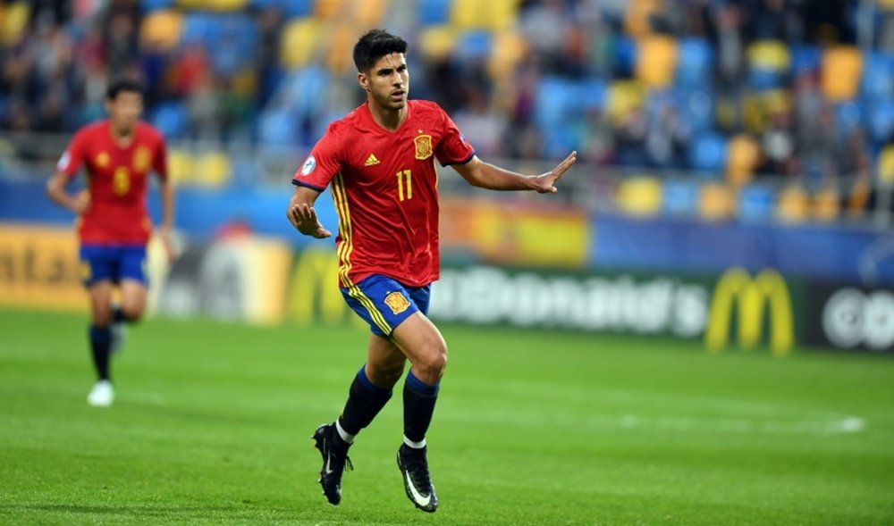 Marco Asensio is happy after scoring his first hat-trick.AFP