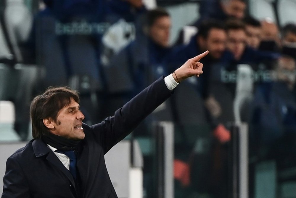 Conte évoque la course au titre. AFP